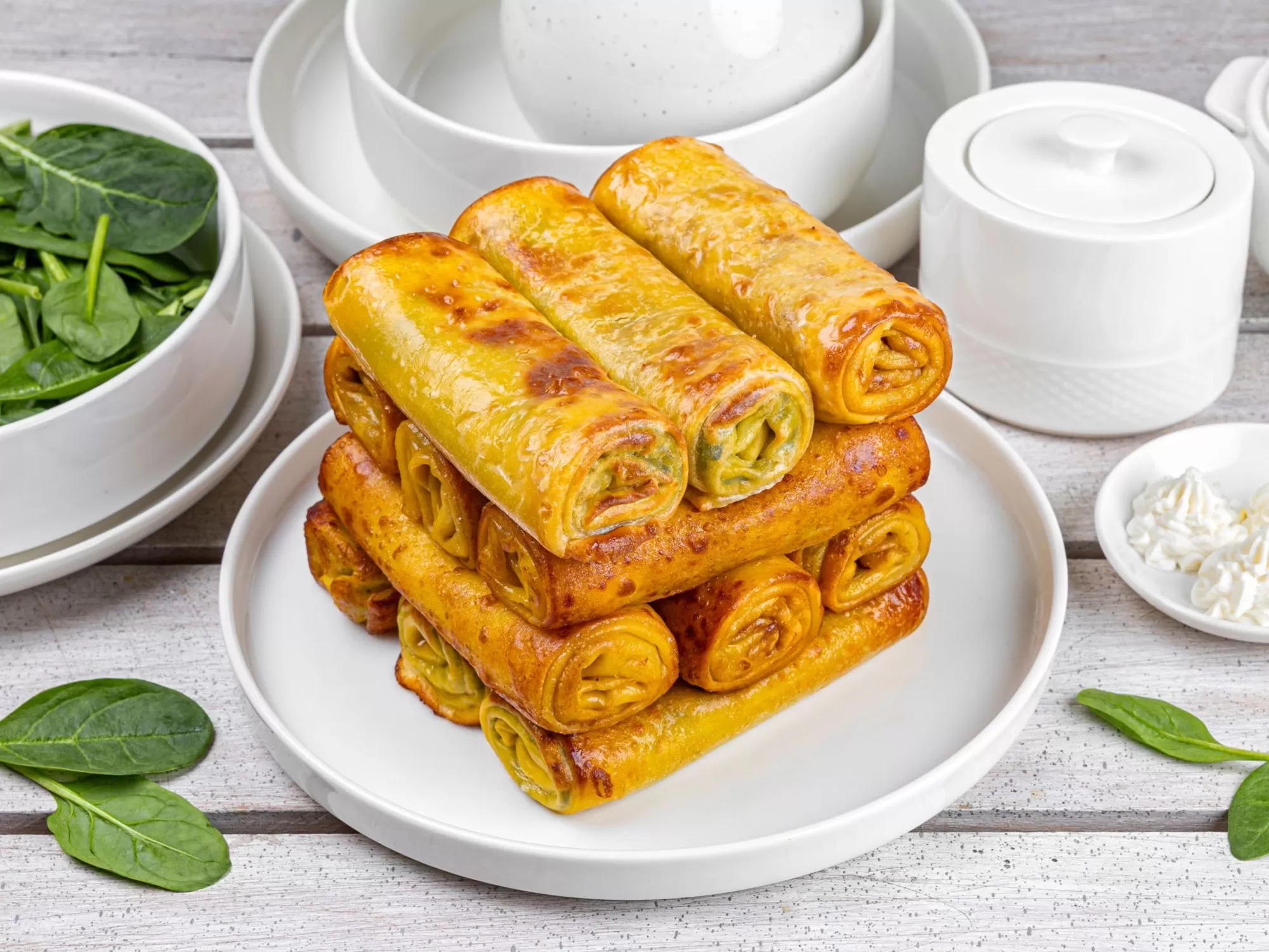 Clătite gratinate cu spanac și cremă rafinată de brânză