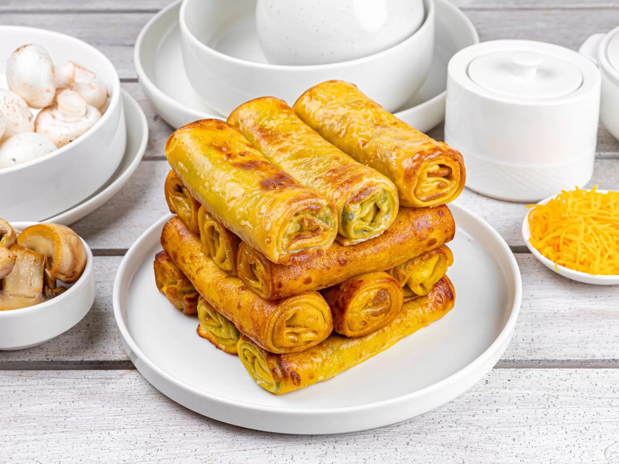 Clătite gratinate cu ciuperci champignon în sos cremos 