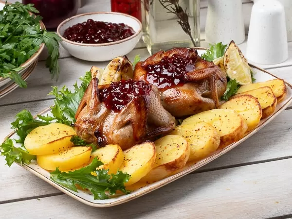 Stuffed quails in blackcurrant sauce