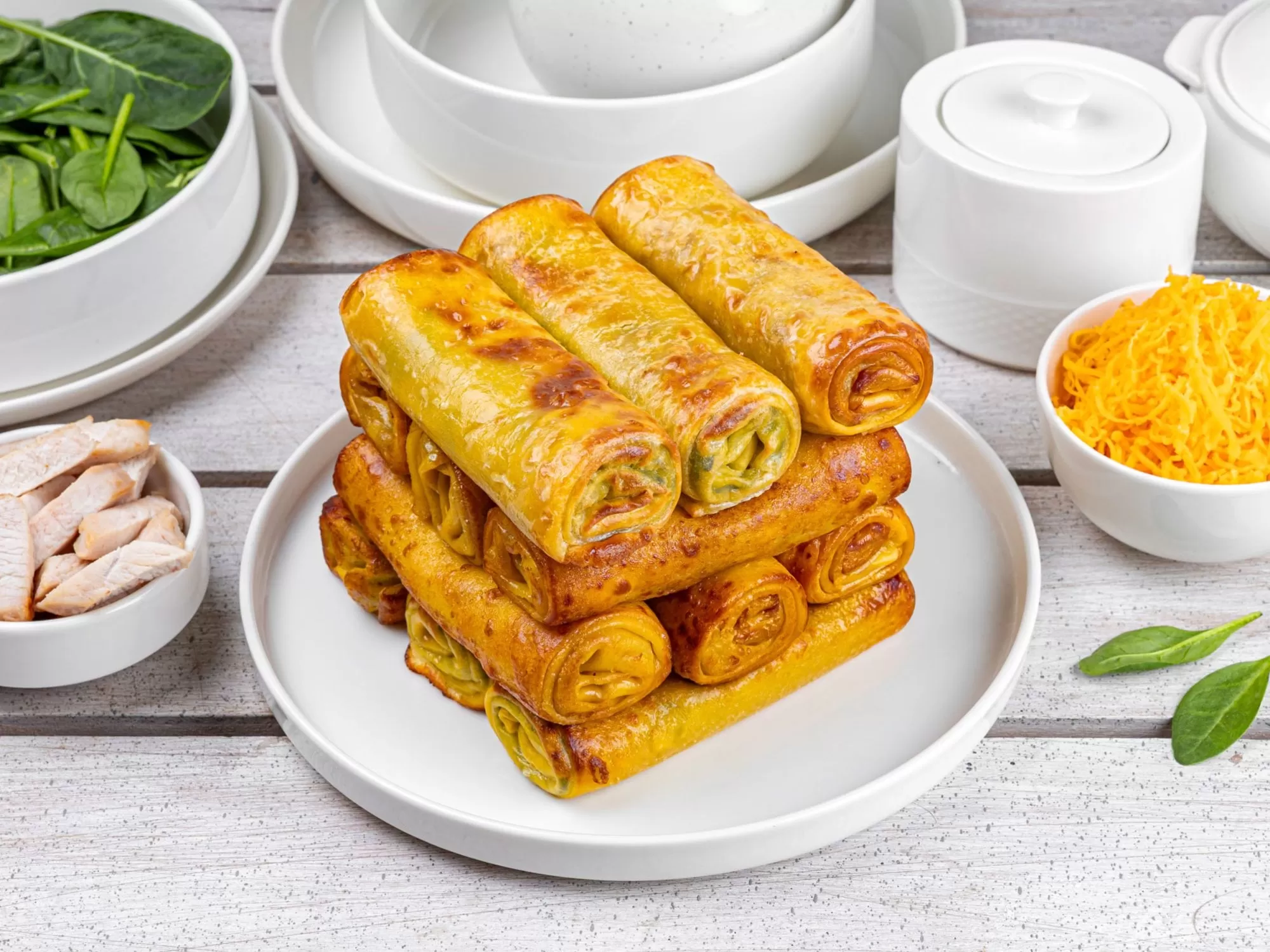 Clătite gratinate cu sufleu din file de pui și spanac